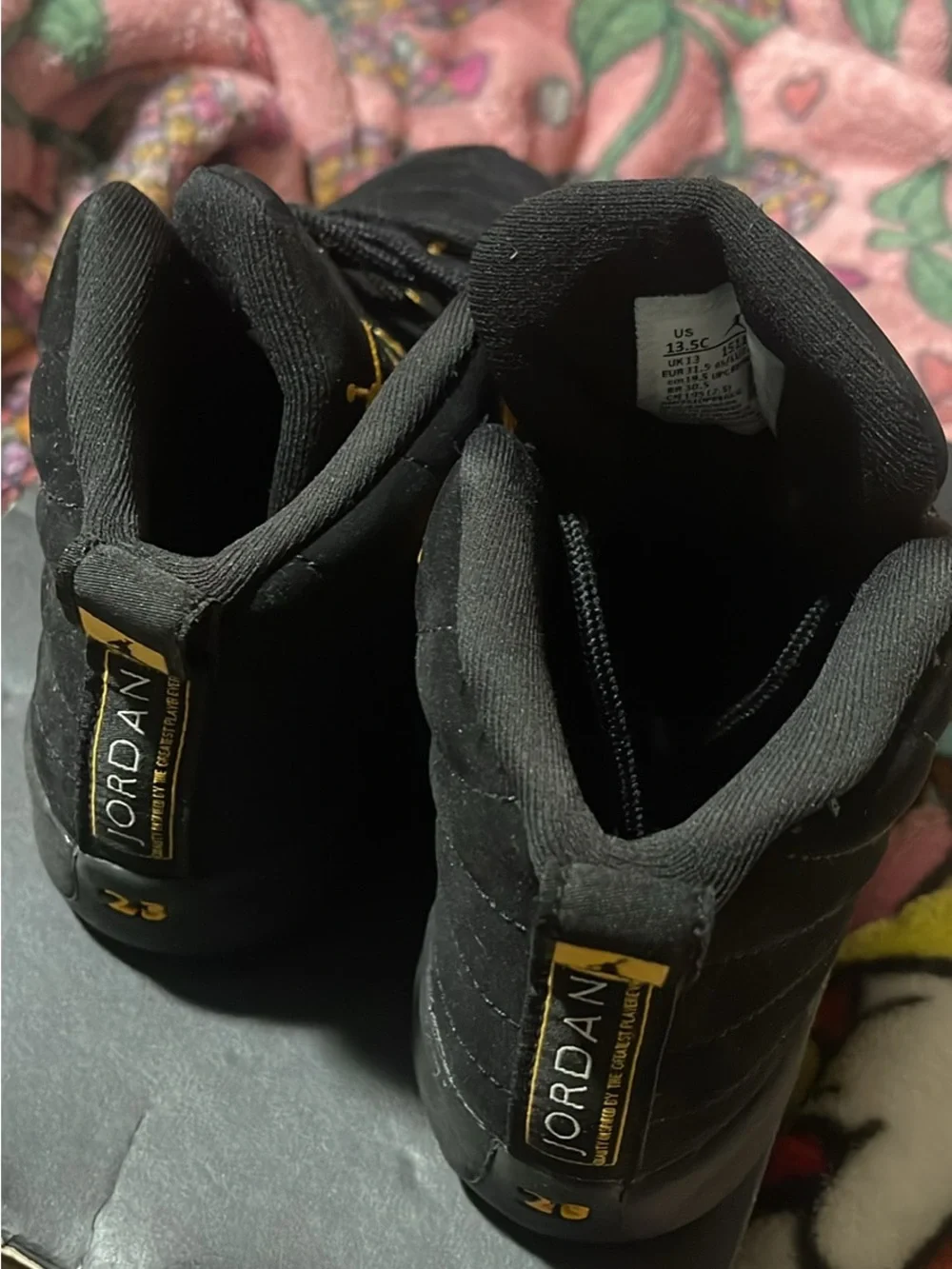 Jordan Black and Gold Logo High-Top Sneakers